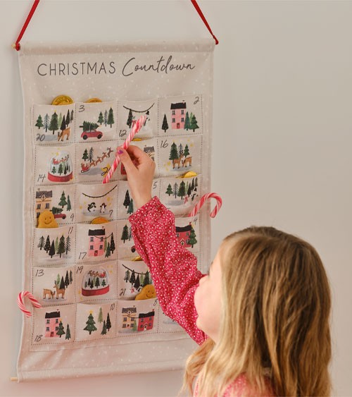 Adventskalender mit bunten Weihnachtsmotiven zum selbst Befüllen mit Süßigkeiten